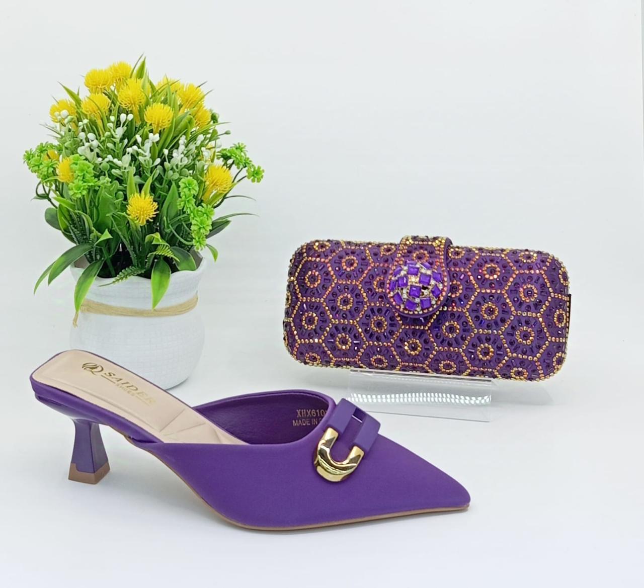 women's clutch and shoes