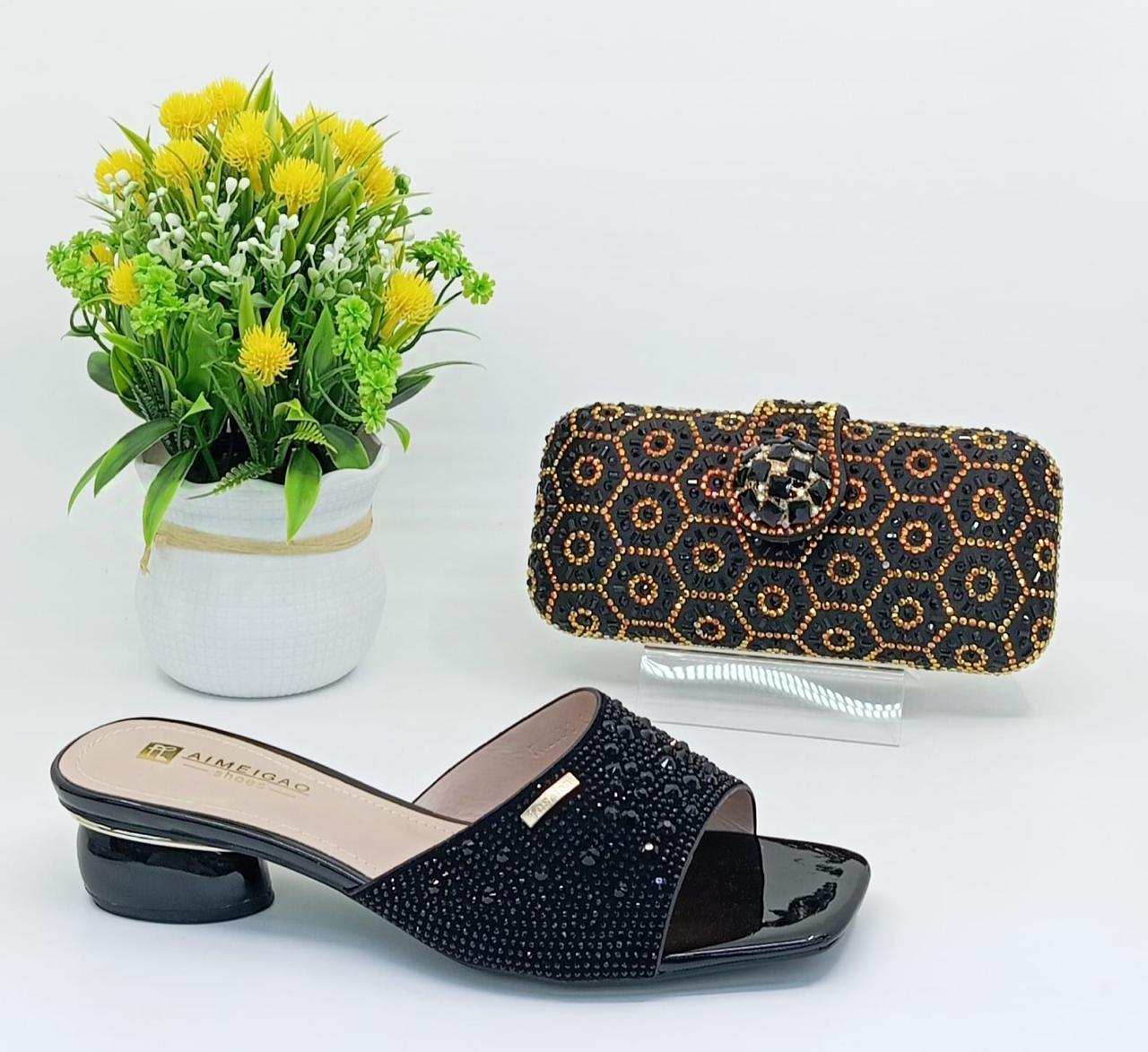 women's clutch and shoes