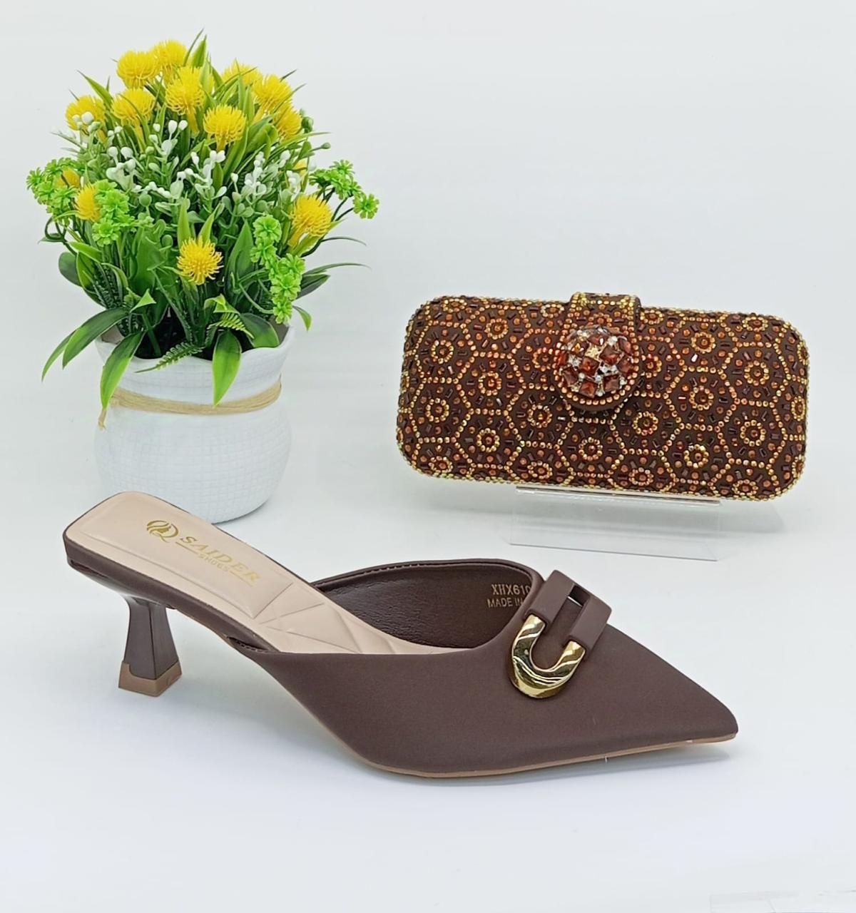 women's clutch and shoes